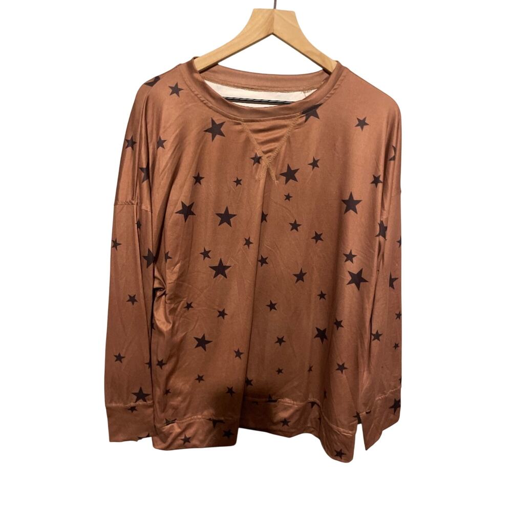 Women’s XXL copper long sleeved tea with black stars.